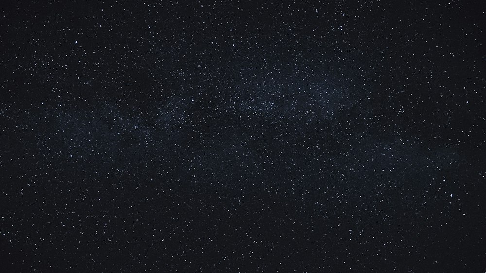 A deep starfield in dark blue, representing the scale of the market the framework observes